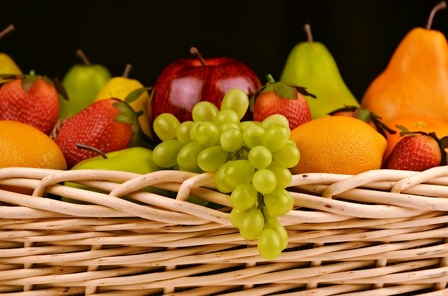 basket with pears, apples and other fruit